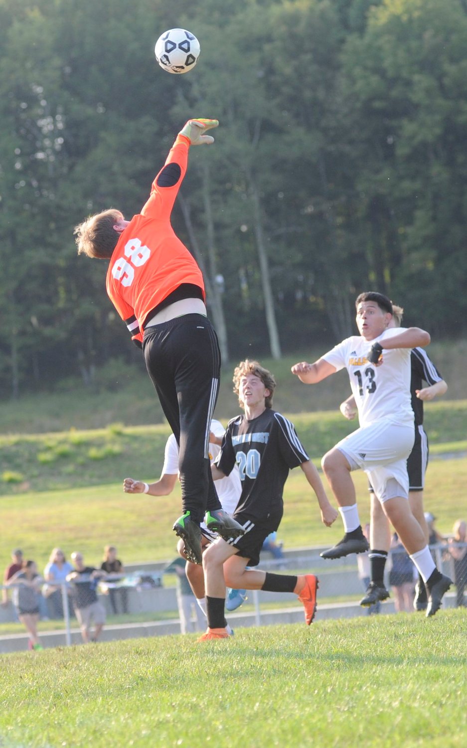 A valiant effort. Will Nearing, Sullivan West’s star goalie, leaps skyward to block a Fallsburg shot on goal. The senior co-captain posted 22 saves against the aggressive Comets’ offense. In the Downsville tourney, he saved the day 28 times.